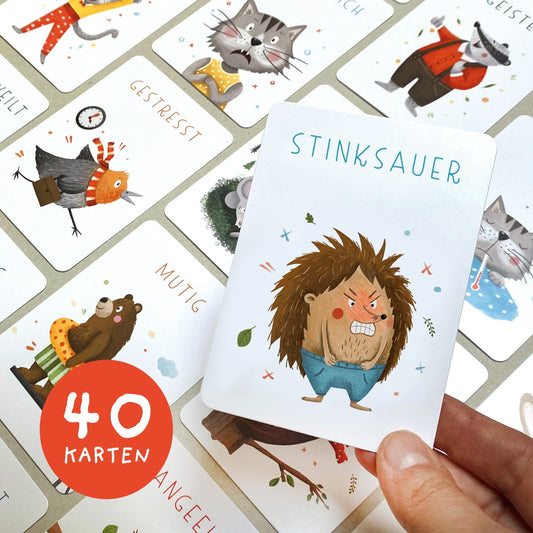 Handgezeichnetes Kartenset mit Gefühlskarten: 40 Karten mit bunten Illustrationen und kindgerechten Beschreibungen von Gefühlen, verpackt in einer Faltschachtel, ideal für die Förderung emotionaler Kompetenz.